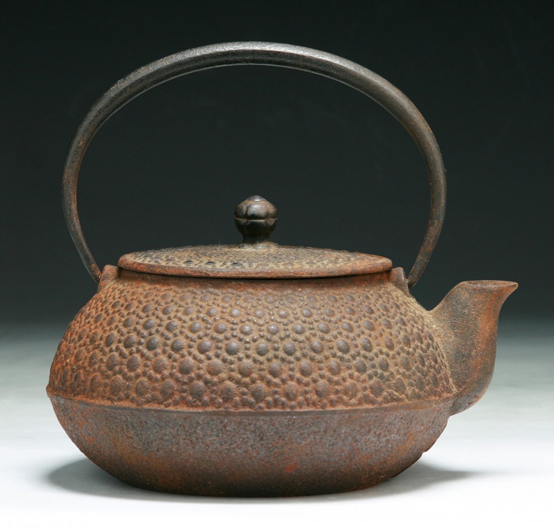 An Antique Japanese Iron Teapot: An Antique Japanese Iron Teapot; Size: H: 5-3/4"; L: 6-1/4"