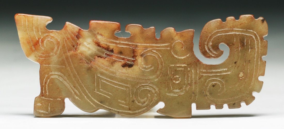 A Chinese Archaic Jade Carving: A Chinese Archaic Jade Carving: finely carved as a Chinese archaic auspicious animal, probably of Warring Period or Han Dynasty; Size: L: 3-1/4"