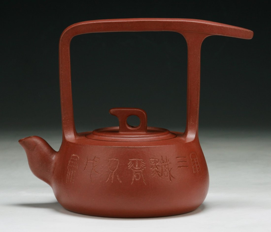 A Chinese Yixing Zisha Teapot: A Chinese Yixing Zisha Teapot; Size: L: 7"