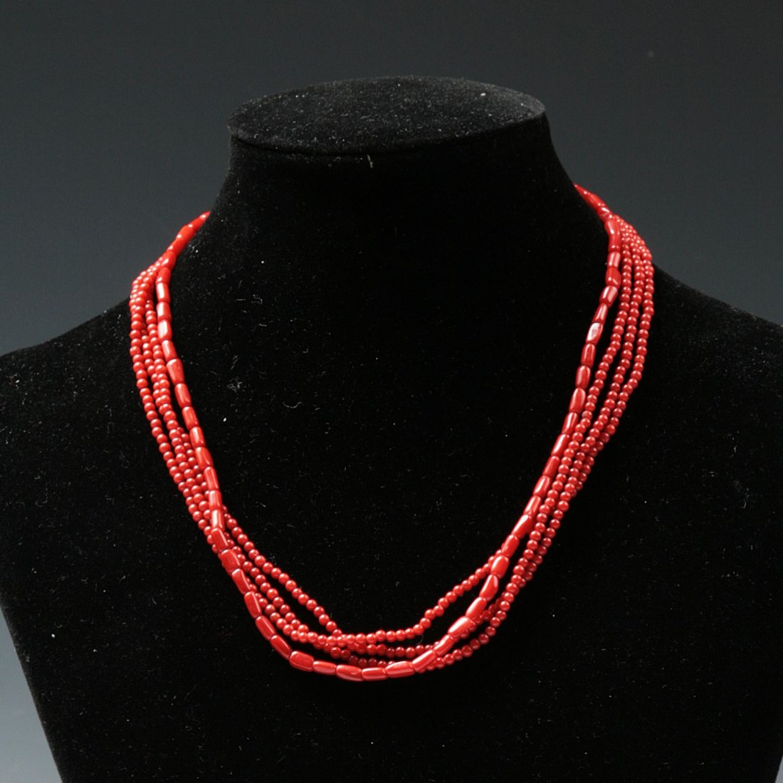 A Four-Strand Red Coral Choker Necklace: A Four-Strand Red Coral Choker Necklace; Size: L: 17"
