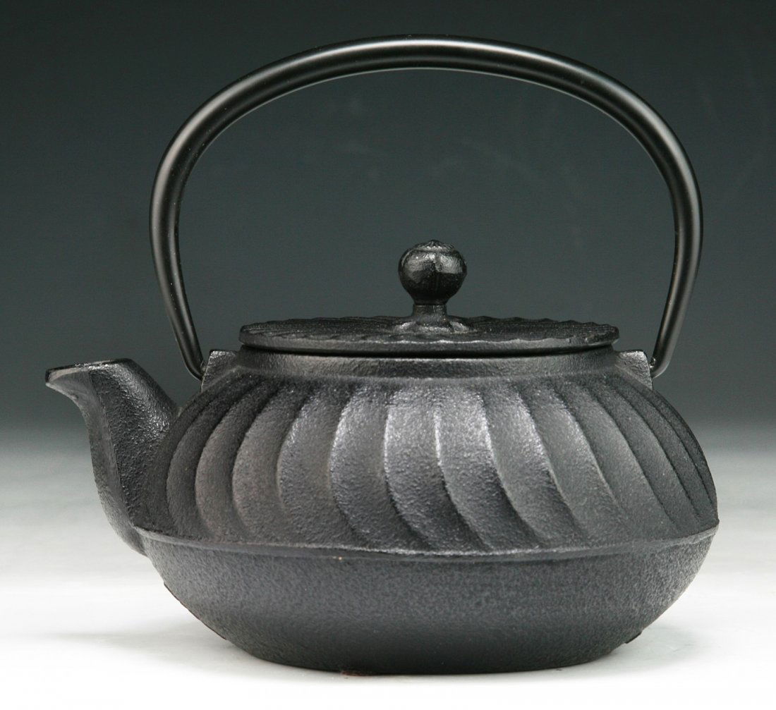 A Japanese Antique Iron Teapot: A Japanese Antique Iron Teapot: Circa 1900; Size: L: 6-1/2"