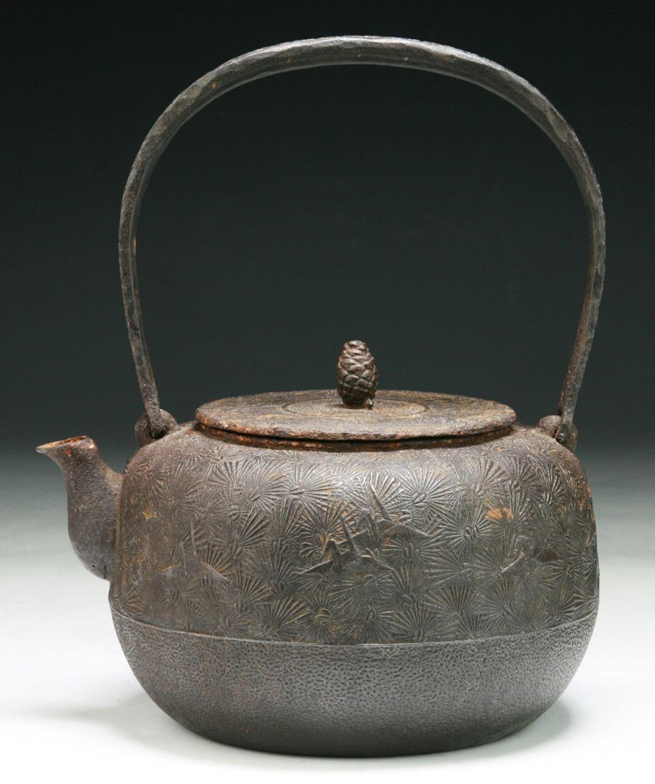 A Japanese Antique Iron Teapot With Cover: A Japanese Antique Iron Teapot With Cover: of 19th Century; Size: H: 8-1/2"; L: 7"