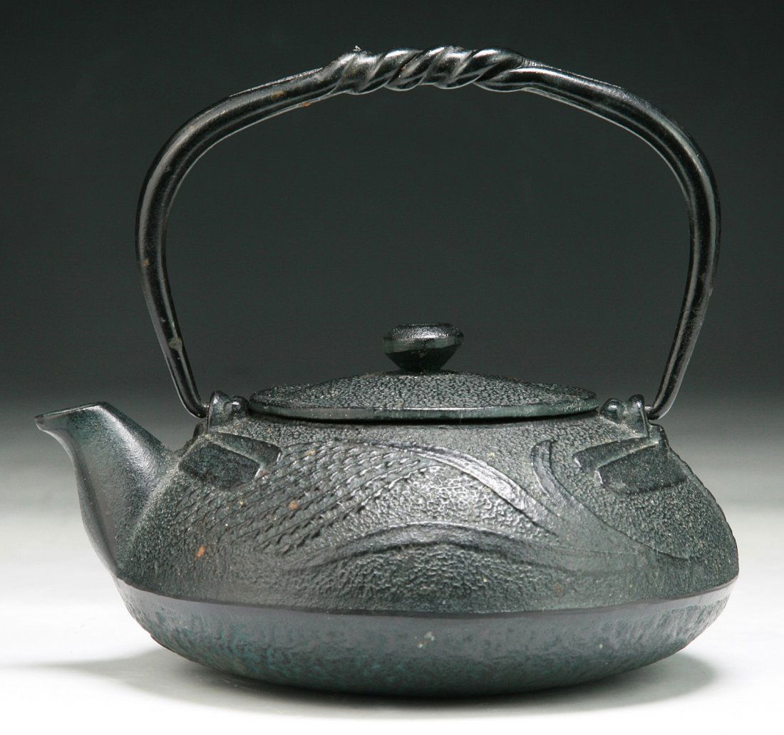 A Japanese Antique Iron Teapot With Cover: A Japanese Antique Iron Teapot With Cover: of 19th Century; Size: H: 5-1/4"; L: 6-1/4"