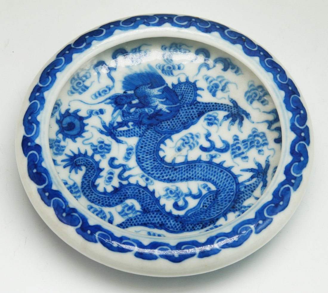 A Chinese Antique Blue & White Porcelain Brush Washer: A Chinese Antique Blue & White Porcelain Brush Washer: very finely painted to the interior with a dragon in flight amid cloud scrolls, the six character 'Qianlong' reign mark signed in cobalt blue on 