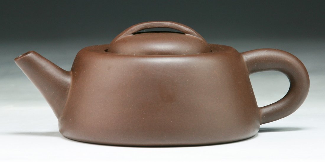 A Chinese Yixing Zisha Teapot: A Chinese Yixing Zisha Teapot; Size: L: 7"