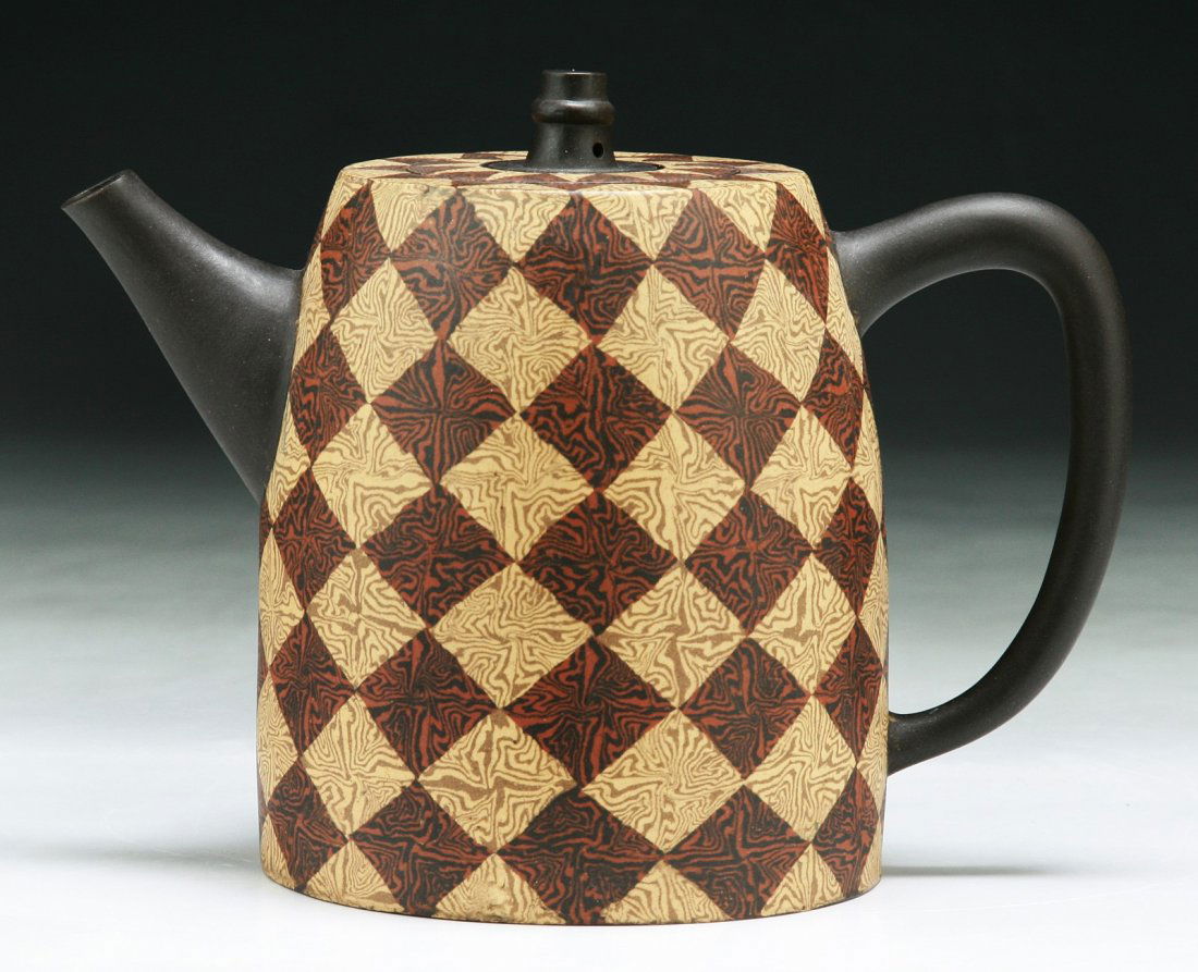 A Chinese Twisted Clay Yixing Zisha Teapot: A Chinese Twisted Clay Yixing Zisha Teapot; Size: L: 7"