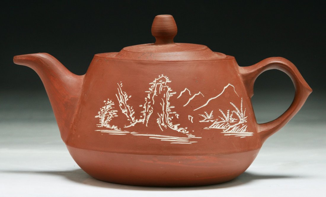 A Chinese Antique Zisha Teapot: A Chinese Antique Zisha Teapot; Size: L: 7-1/2"