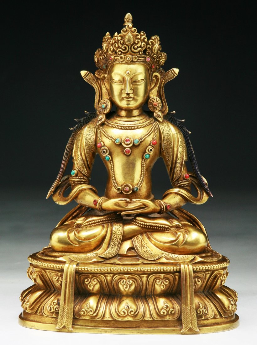 A Rare Tibetan Antique Jeweled Gilt Bronze Buddha: 十 七 世 紀 西 藏 銅 鎏 金 无 量 寿 佛 像 A Rare Tibetan Antique Jeweled Gilt Bronze Amitayus: wearing an ornate cro
