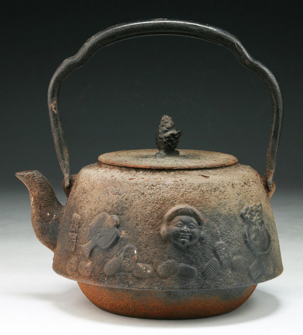 A Japanese Antique Iron Teapot: A Japanese Antique Iron Teapot; Size: L: 8"; H: 8-3/4"