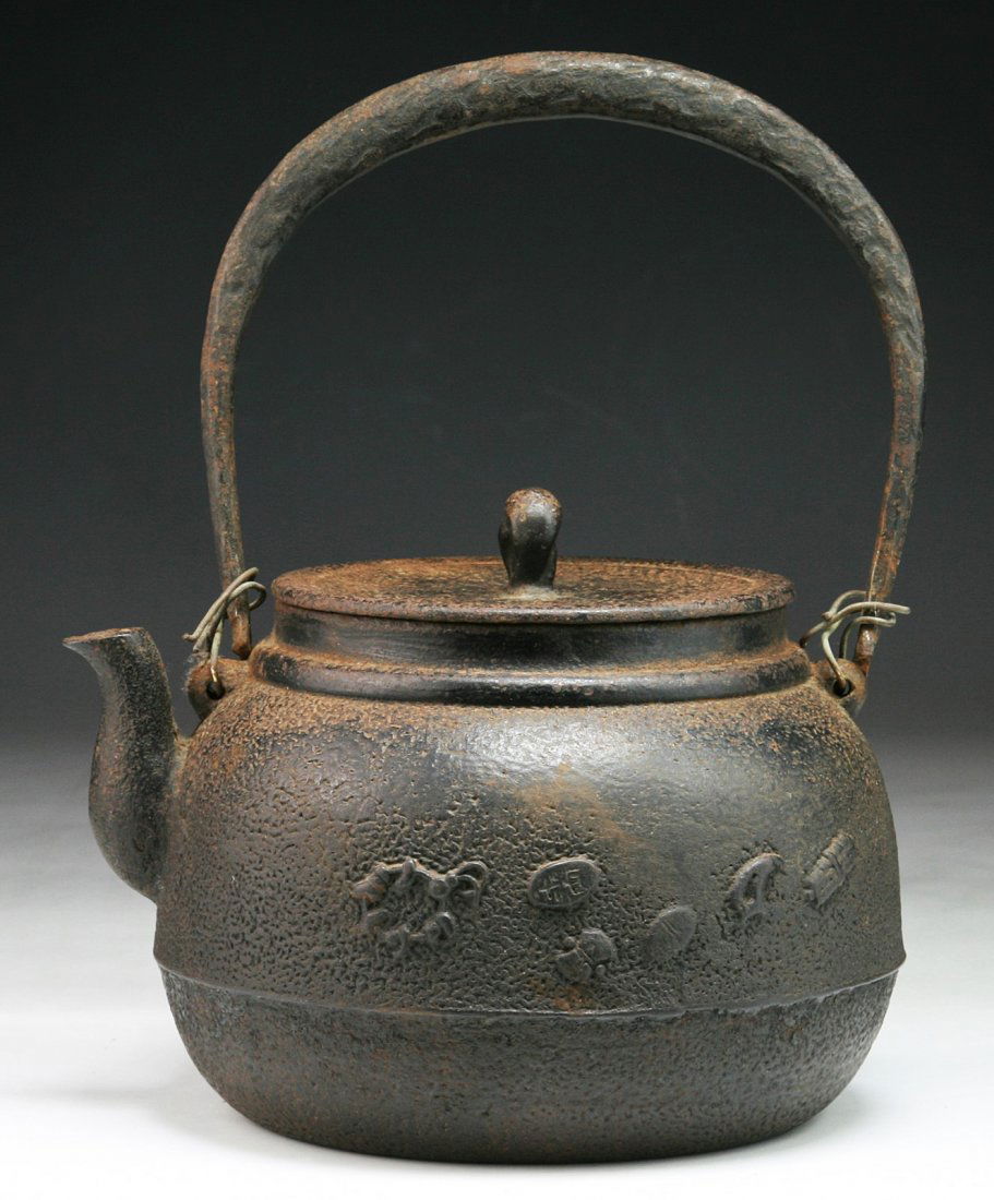 A Japanese Antique Iron Teapot: A Japanese Antique Iron Teapot; Size: L: 7"