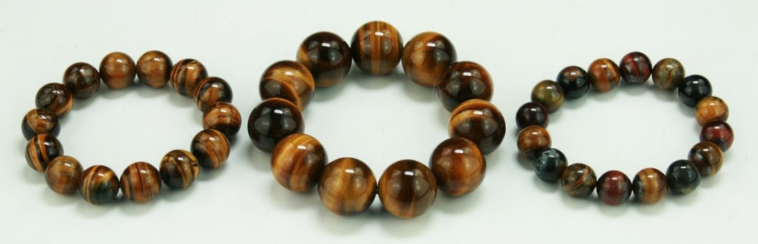 Three (3) Tigereye Bracelets: Three (3) Tigereye Bracelets; Size: D: 3"; (Bead) D: 20mm (biggest)