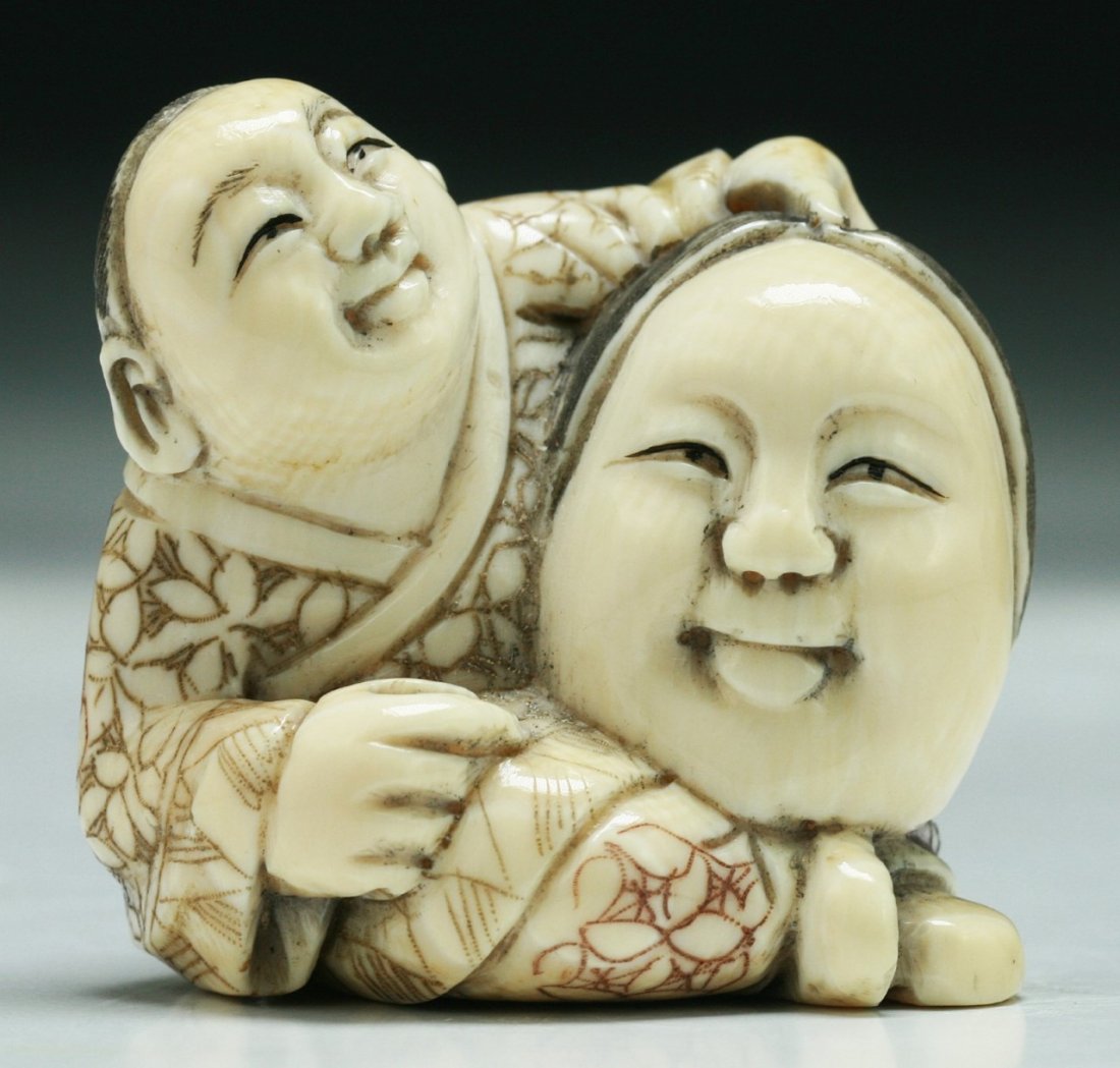A Japanese Antique Ivory Netsuke: A Japanese Antique Ivory Netsuke: figure; Size: H: 1-1/2"