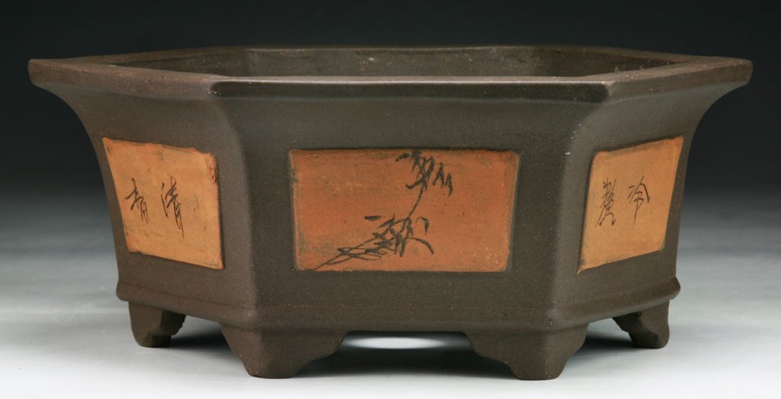 A Chinese Yixing Zisha Pot: A Chinese Yixing Zisha Pot; Size: D: 8-3/4"