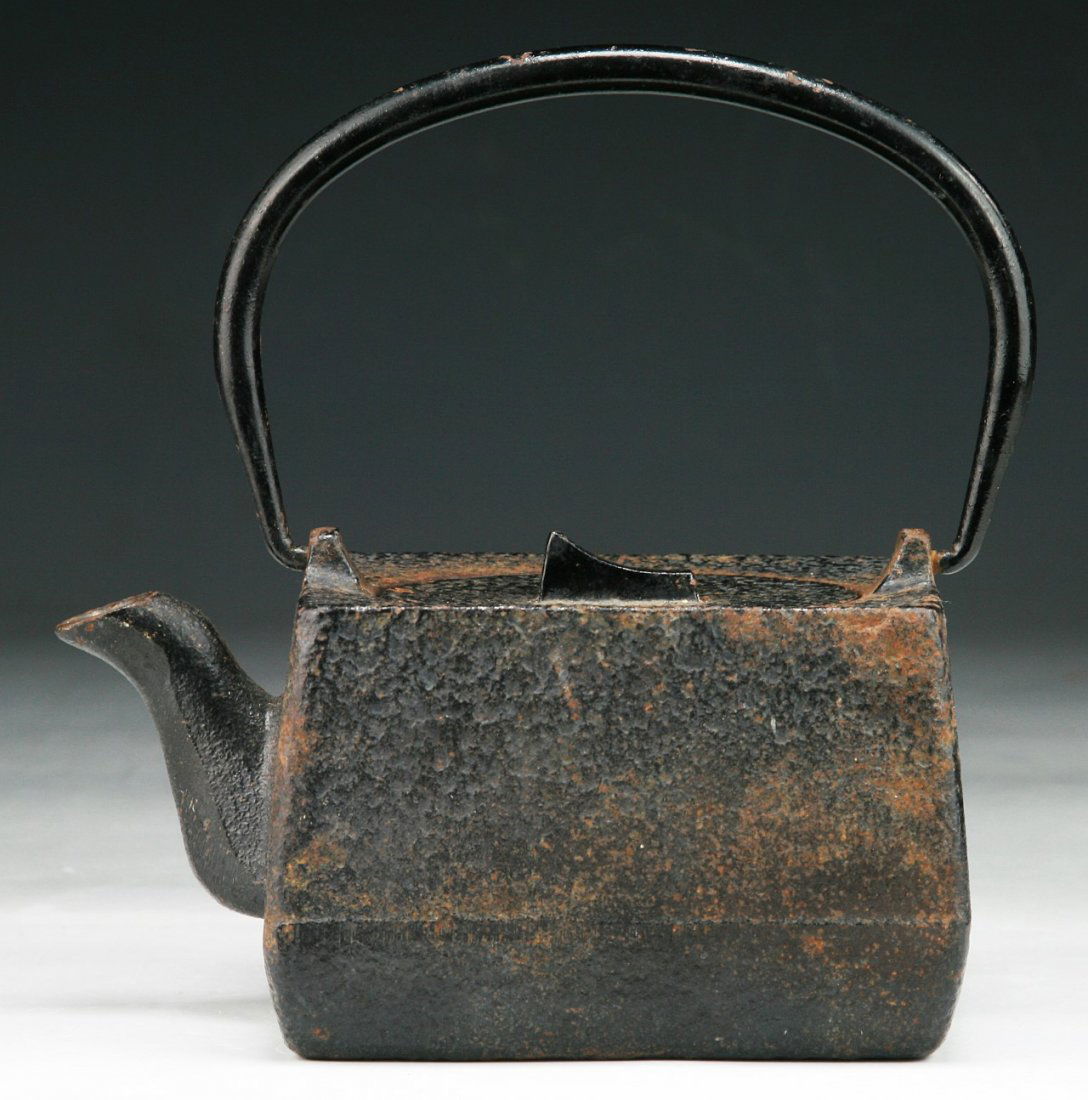 A Japanese Antique Iron Teapot With Cover: A Japanese Antique Iron Teapot With Cover: Circa 1900; Size: L: 5-3/4"