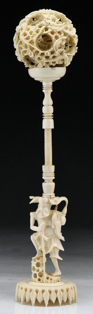 A Chinese Antique Carved Ivory Puzzle Ball: A Chinese Antique Carved Ivory Puzzle Ball; Size: H: 13"