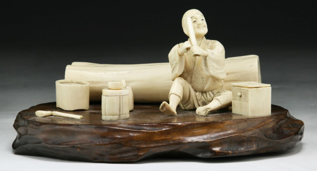 A Japanese Antique Carved Ivory Figure Group: A Japanese Antique Carved Ivory Figure Group; Size: L: 9" (overall)