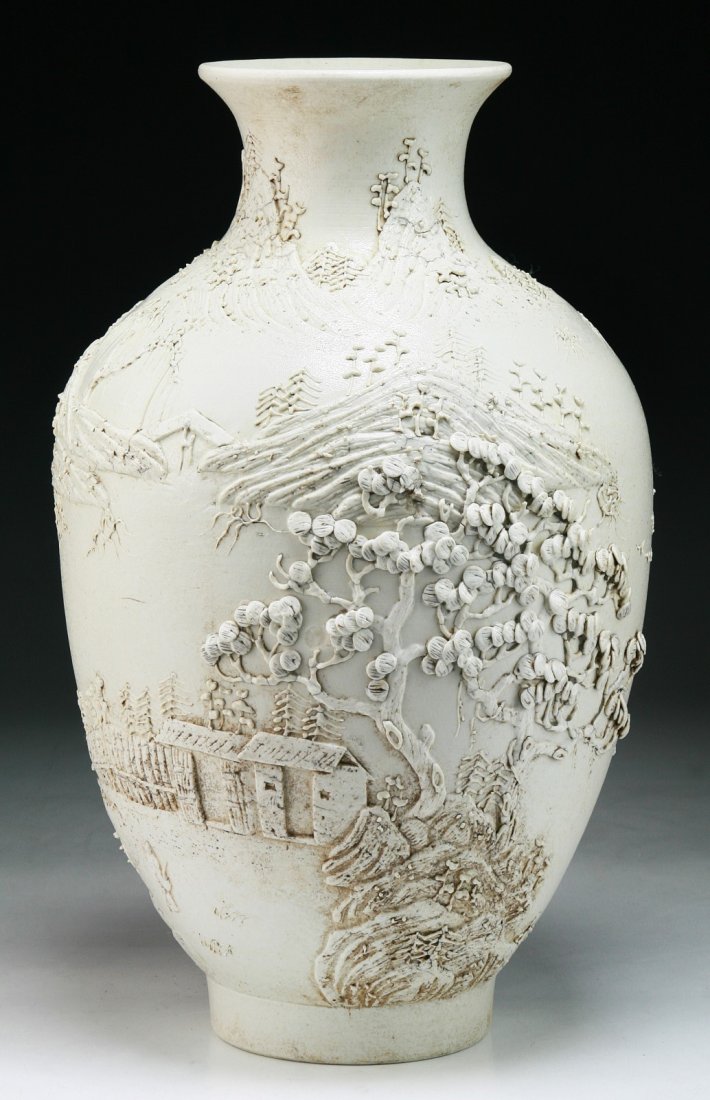 A Chinese Antique White Glazed Porcelain Vase: A Chinese Antique White Glazed Porcelain Vase: signed 'Wang Bingrong' on the base and of Minguo Period; Size: H: 13-3/4"