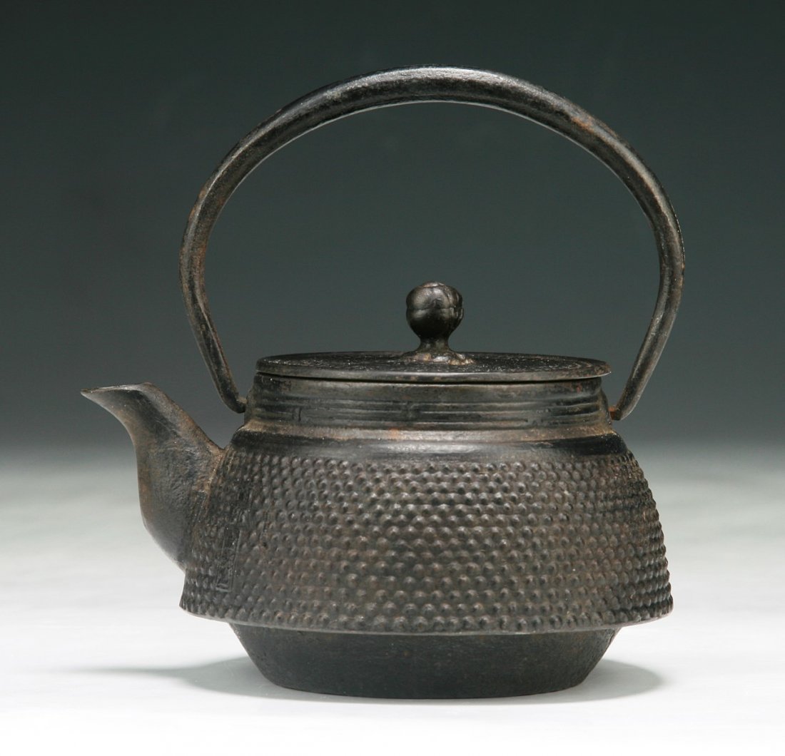 A Japanese Antique Iron Teapot: A Japanese Antique Iron Teapot: of late 19th Century; Size: H: 5"