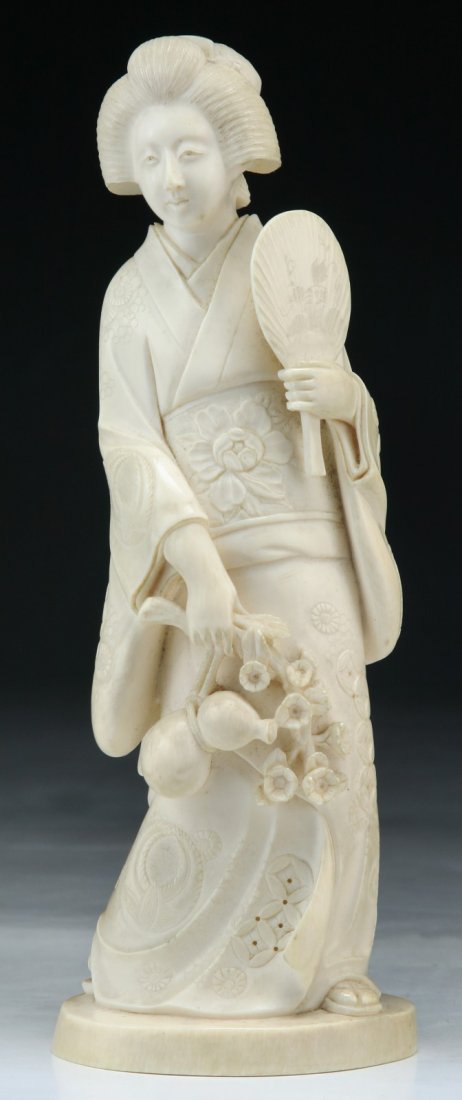 A Japanese Antique Carved Ivory Beauty: A Japanese Antique Carved Ivory Beauty; Size: H: 8"
