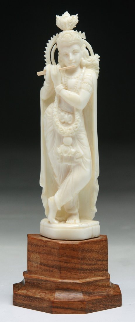 An Indian Antique Carved Ivory Deity Krishna: An Indian Antique Carved Ivory Deity Krishna; Size: H: 5-1/4" (overall)