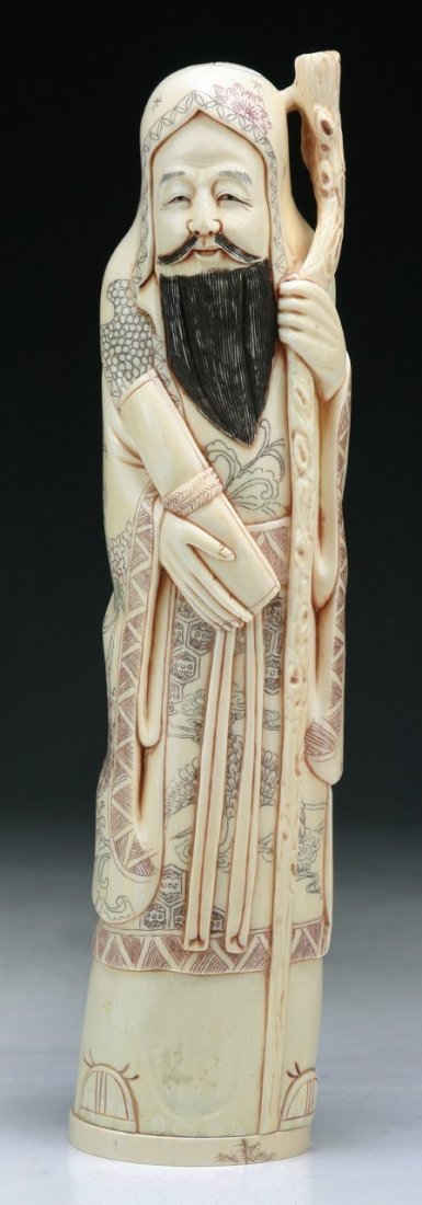A Japanese Antique Carved Ivory Figure: A Japanese Antique Carved Ivory Figure; Size: H: 12-1/4"