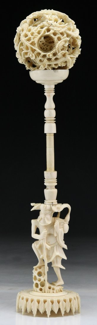 A Chinese Antique Carved Ivory Puzzle Ball: A Chinese Antique Carved Ivory Puzzle Ball; Size: H: 13"
