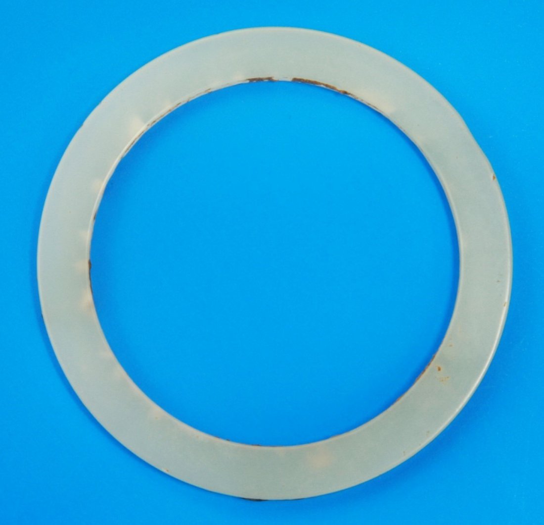 A Chinese Archaic Jade Bangle: A Chinese Archaic Jade Bangle; Size: D: 75mm