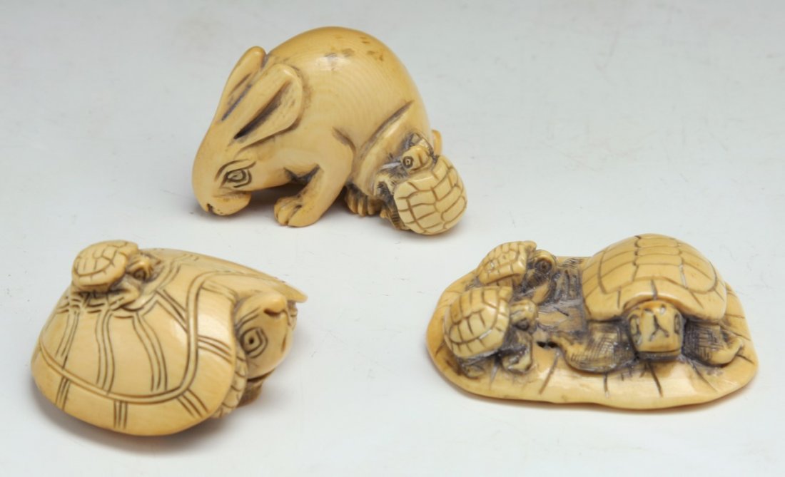 Three (3) Japanese Antique Carved Ivory Netsuke: Three (3) Japanese Antique Carved Ivory Netsuke: one carved with three turtles on a lily pad, one carved as a little turtle on top of a big one, one carved as a rabbit with a little turtle beside it;