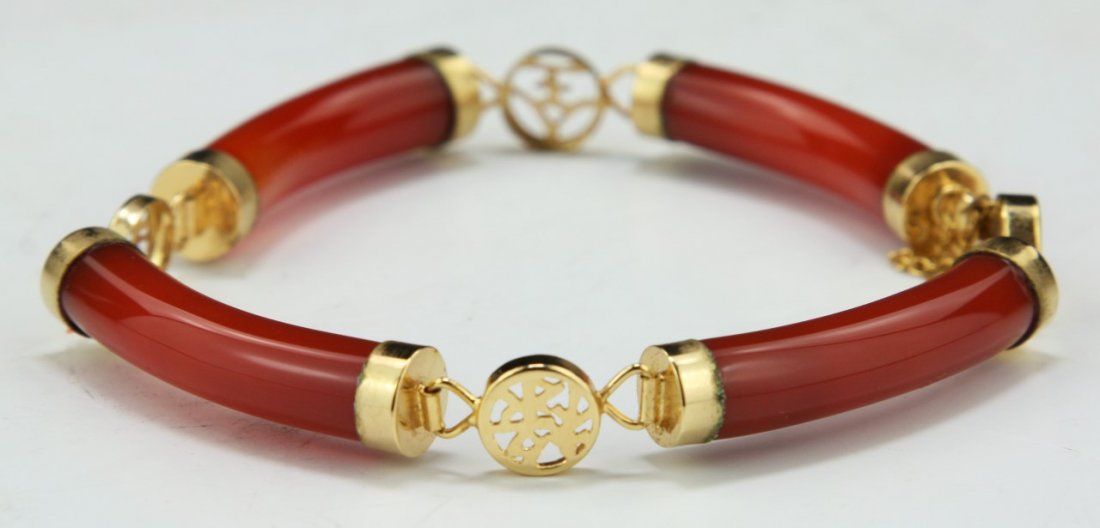 A Carnelian Agate Gold Bracelet: A Carnelian Agate Gold Bracelet; Size: D: 2-1/2"