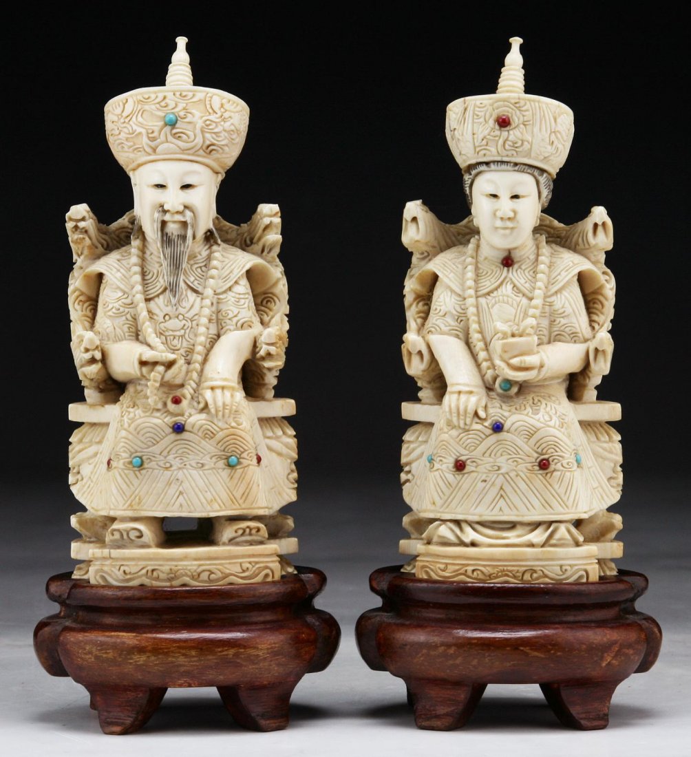 Pair Of Chinese Antique Jeweled Ivory Emperor & Empress: A Pair Of Chinese Antique Jeweled Ivory Emperor & Empress: each carved as a seated figure, dressed in court robes decorated with coral, turquoise and carnelian agate beads, both with wood bases; Size;