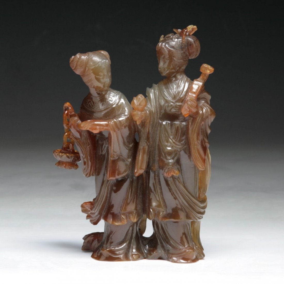 A Chinese Antique Carved Carnelian Agate Beauty Group: 清 紅瑪瑙雕仕女擺件 Chinese Antique Carved Agate Beauties: rare and antique, finely carved from the carnelian agate with warm red tone as two 