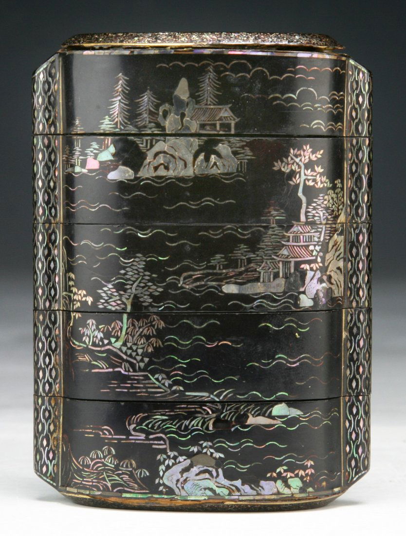 A Japanese Antique Inlaid Lacquer Inro: A Japanese Antique Inlaid Lacquer Inro: Finely detailed black lacquer five-case inro; inlaid with mother of pearl low relief scene of landscape on both sides; Size: H: 4"