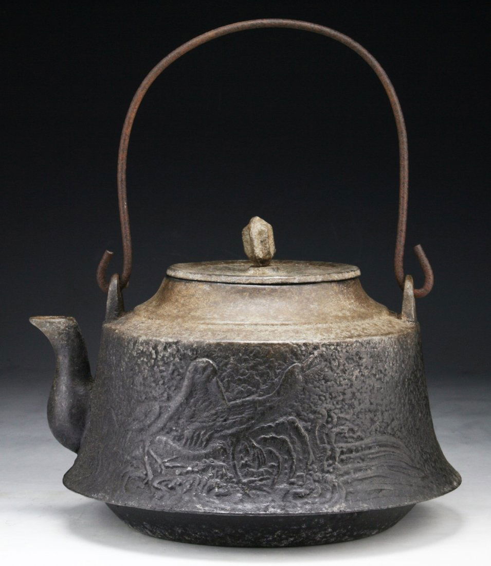 A Japanese Antique Iron Teapot: A Japanese Antique Iron Teapot; Size: L: 10"; H: 6-3/4"