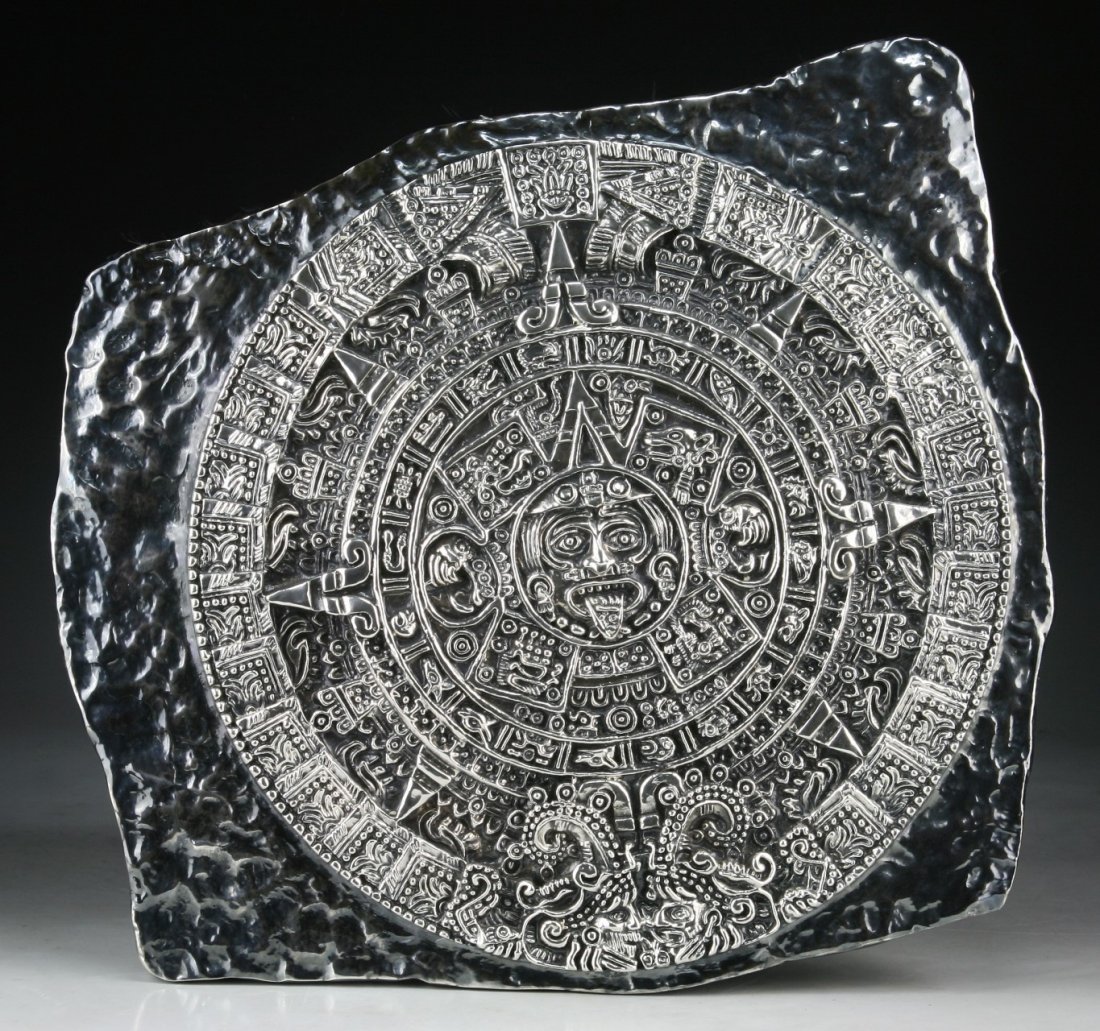 A 999 Silver Mayan Calendar: A 999 Silver Mayan Calendar: weighing 2,860 grams; Size: L: 13"; W: 12-1/2"; Weight: 2,860 grams