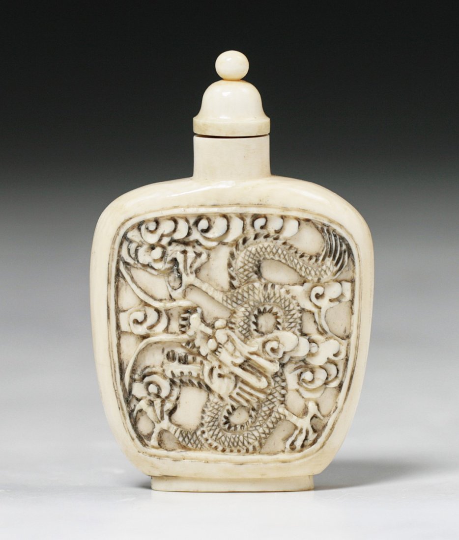 A Chinese Antique Carved Ivory Snuff Bottle: A Chinese Antique Carved Ivory Snuff Bottle: finely carved with the scene of figures on one side and landscape on the other, African ivory, Late Qing Dynasty (19th Century), NO INTERNATIONAL SHIPPING 