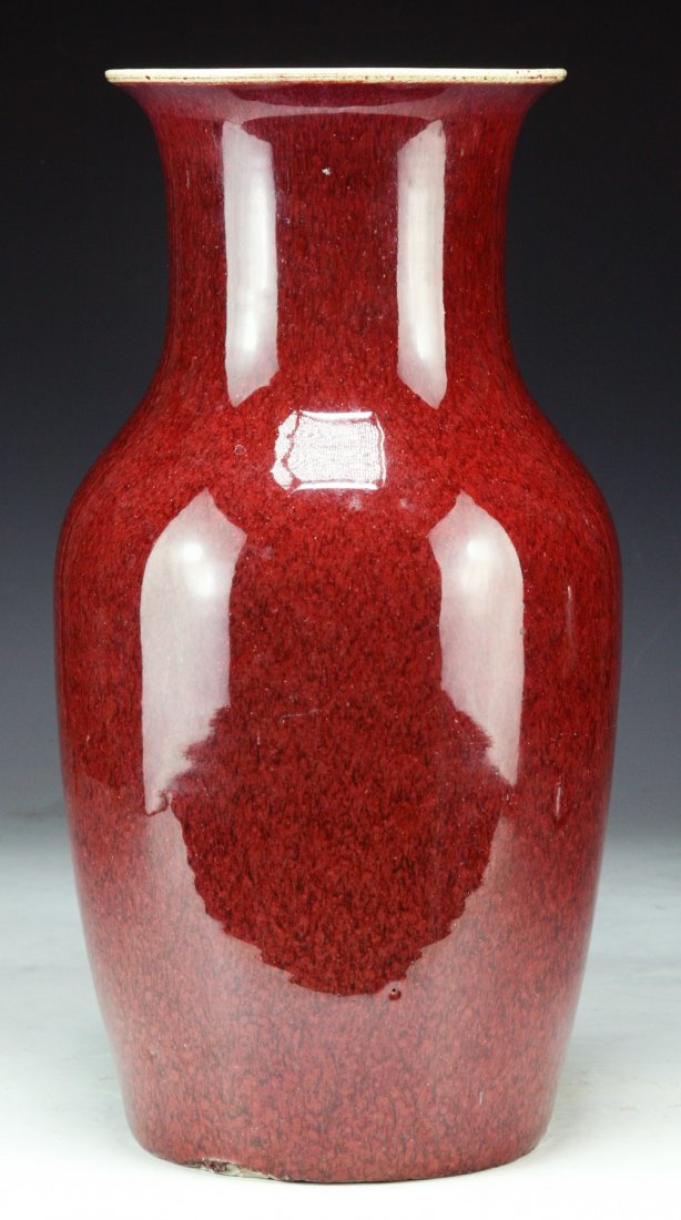 A Chinese Antique Ox Blood Glazed Porcelain Vase: A Chinese Antique Ox Blood Glazed Porcelain Vase: of Mid-Qing Dynasty; Size: H: 14"