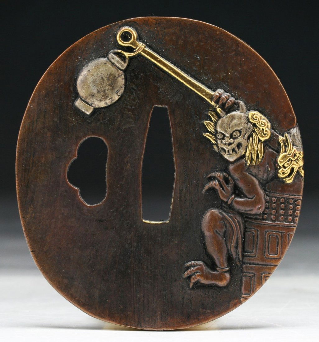 A Japanese Antique Bronze Tsuba: A Japanese Antique Bronze Tsuba; Size: D: 3"