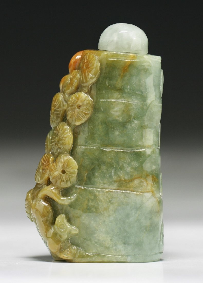 A Chinese Carved Jadeite Snuff Bottle (1 of 2)