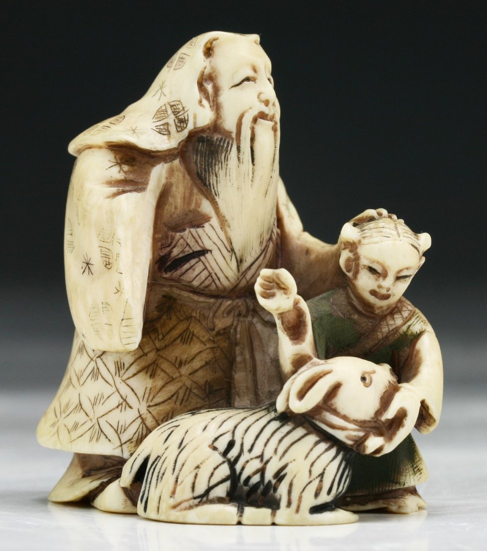 A Japanese Antique Polychrome Carved Ivory Netsuke (1 of 4)