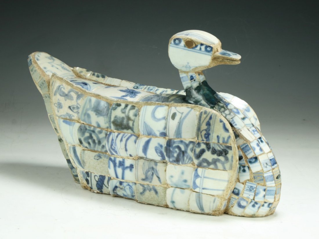 A Chinese Antique Blue & White Chipped Porcelain Duck: A Chinese Antique Blue & White Chipped Porcelain Duck Shaped Tureen: of duck shape, comprised of blue and white porcelain chips, chips are of Ming Dynasty; Size: L: 13-1/2"