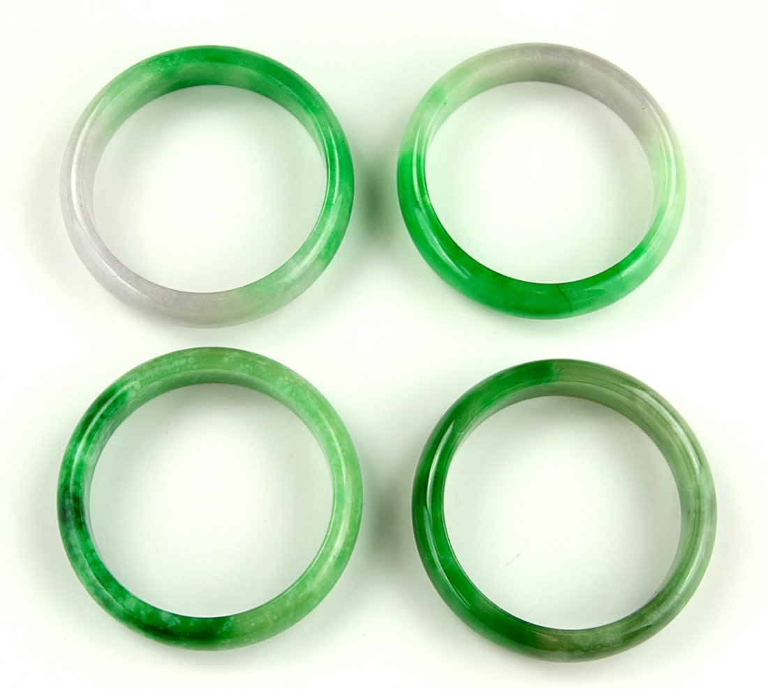 Four (4) Jadeite Or Stone Bangles (1 of 2)
