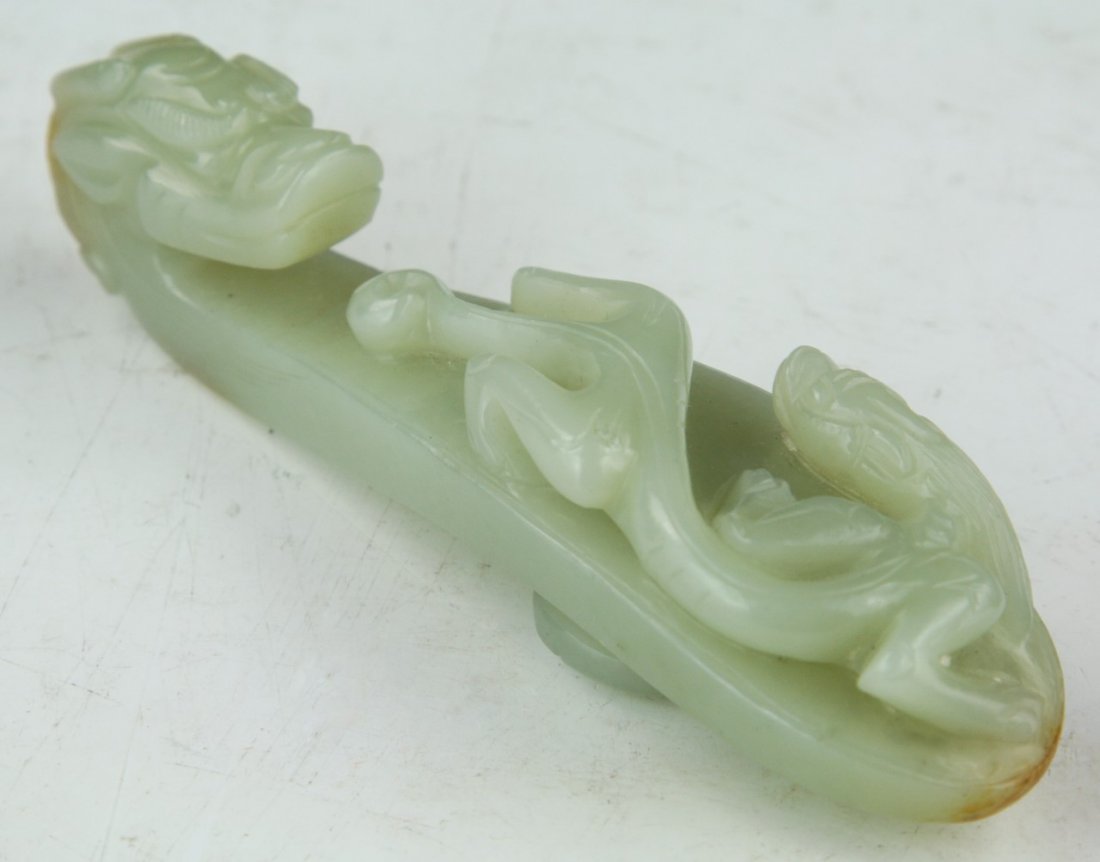 A Chinese Celadon Jade Dragon Shaped Buckle (1 of 4)