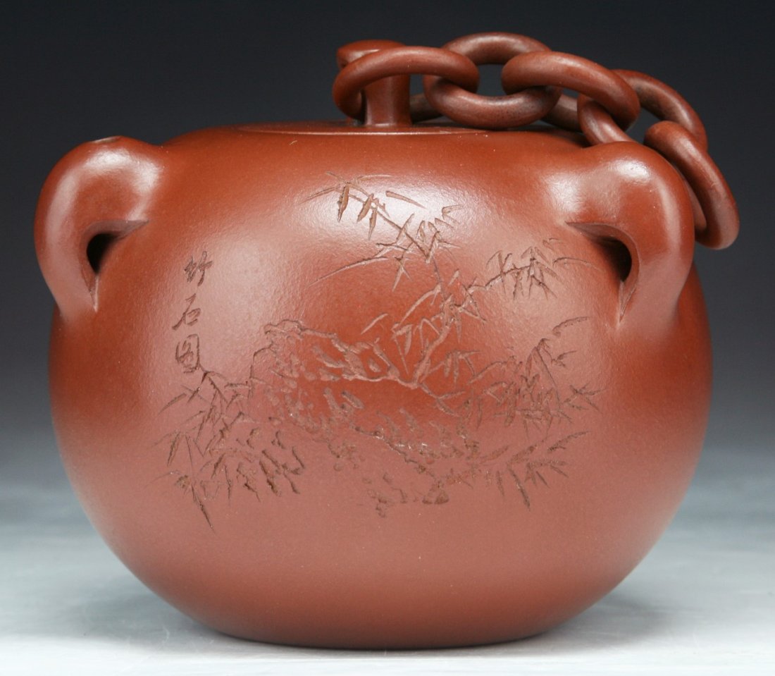 A Chinese Yixing Zisha Water Dripper: A Chinese Yixing Zisha Water Dripper; Size: D: 4-1/2"