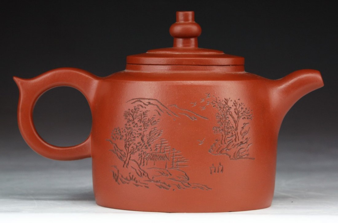 A Chinese Yixing Zisha Teapot: A Chinese Yixing Zisha Teapot; Size: L: 6"