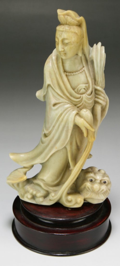 A Chinese Soapstone Carved Guanyin: A Chinese Soapstone Carved Guanyin; Size: H: 6-3/4"; (overall) H: 8-1/2"