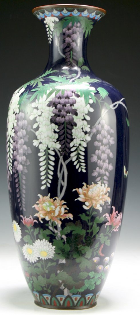 A Big Japanese Antique Cloisonne on Bronze Vase: 十九世紀日本七寶燒花卉紋瓶 A Big Japanese Antique Cloisonne on Bronze Vase: of bottled form rising to a flared open mouth,