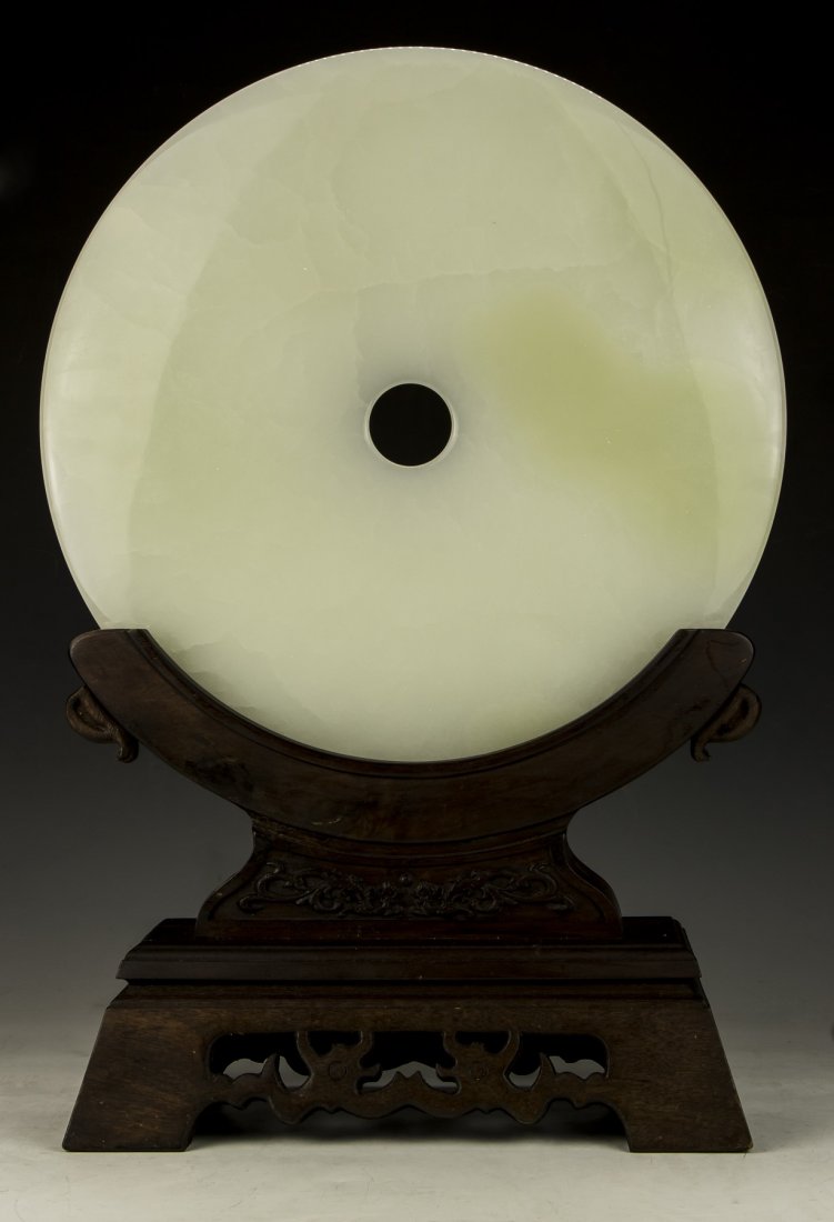 A Big Serpentine Jade Bi With Stand (1 of 3)