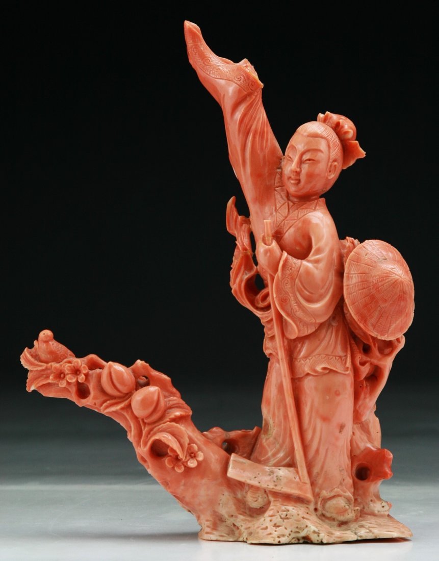 A Chinese Antique Carved Momo Red Coral Figure (1 of 5)