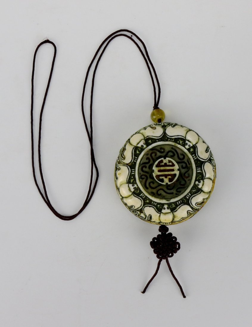 A Chinese Antique Polychrome Ivory Carved Pendant (1 of 4)