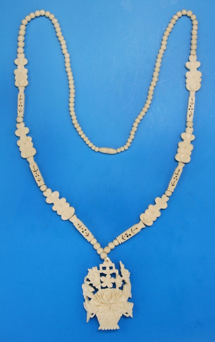 A Chinese Antique Carved Ivory Pendant Necklace (1 of 4)